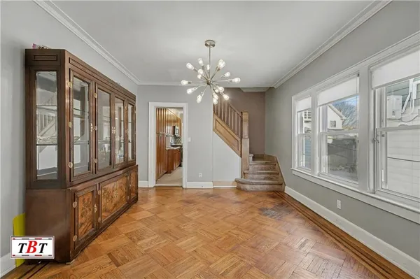 a view of a hallway with windows