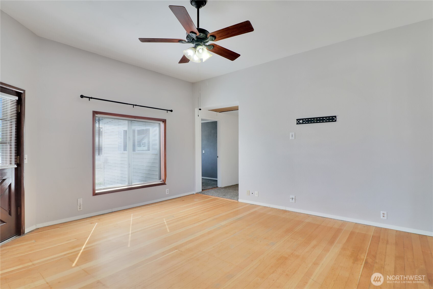 108 2nd Street Southeast Rainier, WA 98576 - Photo 4 of 40 a view of an empty room with a window