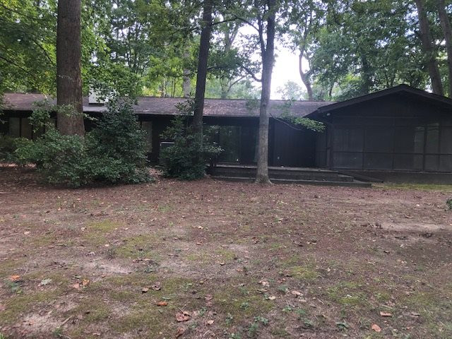 3307 Timberlake Road Raleigh, NC 27604 - Photo 11 of 21 a backyard of a house with lots of green space