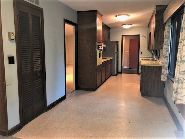 3307 Timberlake Road Raleigh, NC 27604 - Photo 5 of 21 a view of hallway with bathroom and mirror