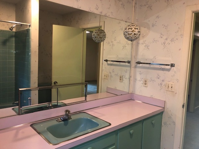 3307 Timberlake Road Raleigh, NC 27604 - Photo 9 of 21 a bathroom with a sink and a mirror