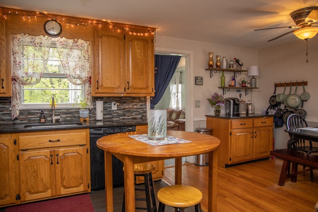 75 Sagamore Road West Springfield, MA 01089 - Photo 14 of 24 a kitchen with stainless steel appliances granite countertop a kitchen island a stove a cabinets a sink and a window
