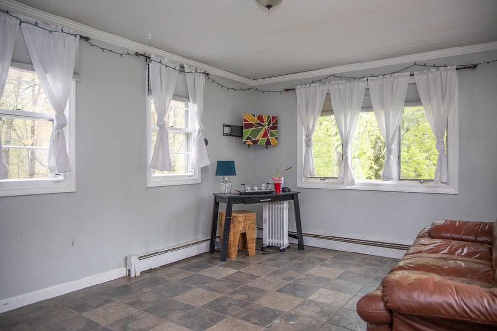 75 Sagamore Road West Springfield, MA 01089 - Photo 16 of 24 a living room with furniture and a window