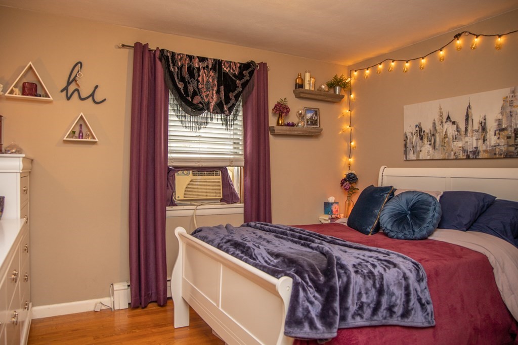 75 Sagamore Road West Springfield, MA 01089 - Photo 20 of 24 a bedroom with a bed and wall painting
