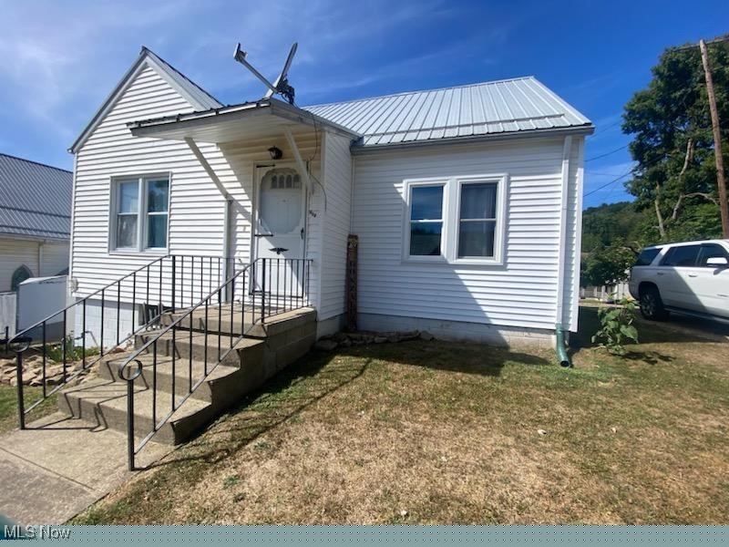 101 Eastport Road Scio, OH 43988 - Photo 2 of 30 Bungalow featuring a front lawn