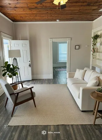 a living room with furniture and a couch