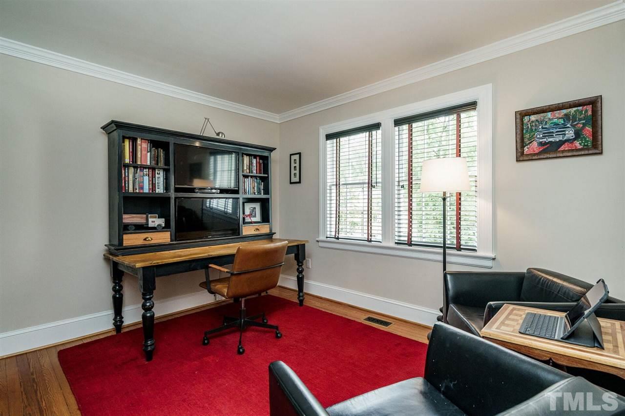 503 Yarmouth Road Raleigh, NC 27608 - Photo 19 of 30 a view of a workspace with furniture and a window