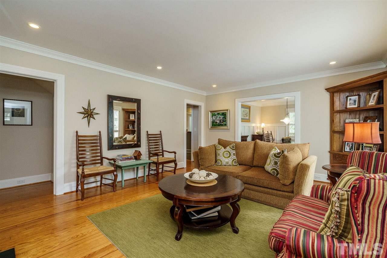 503 Yarmouth Road Raleigh, NC 27608 - Photo 3 of 30 a living room with furniture and wooden floor