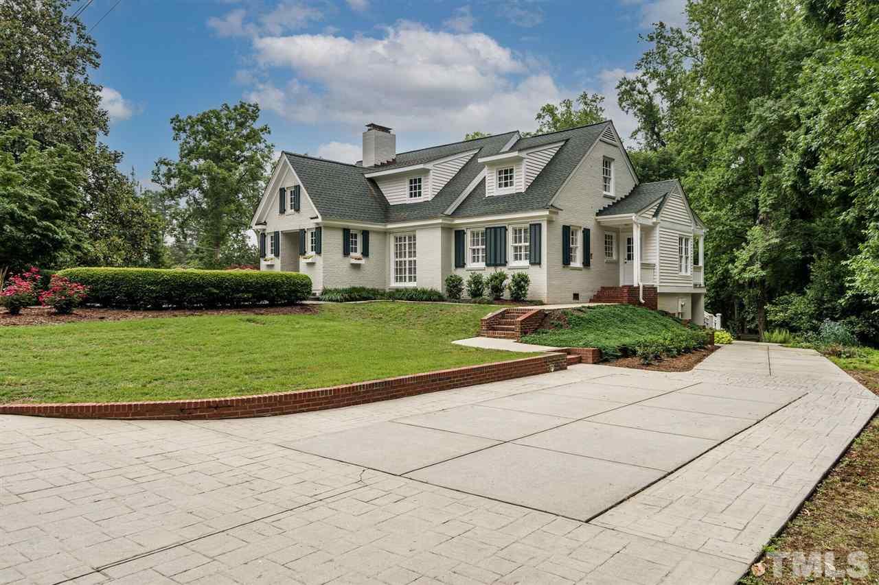 503 Yarmouth Road Raleigh, NC 27608 - Photo 29 of 30 a front view of a house with a garden