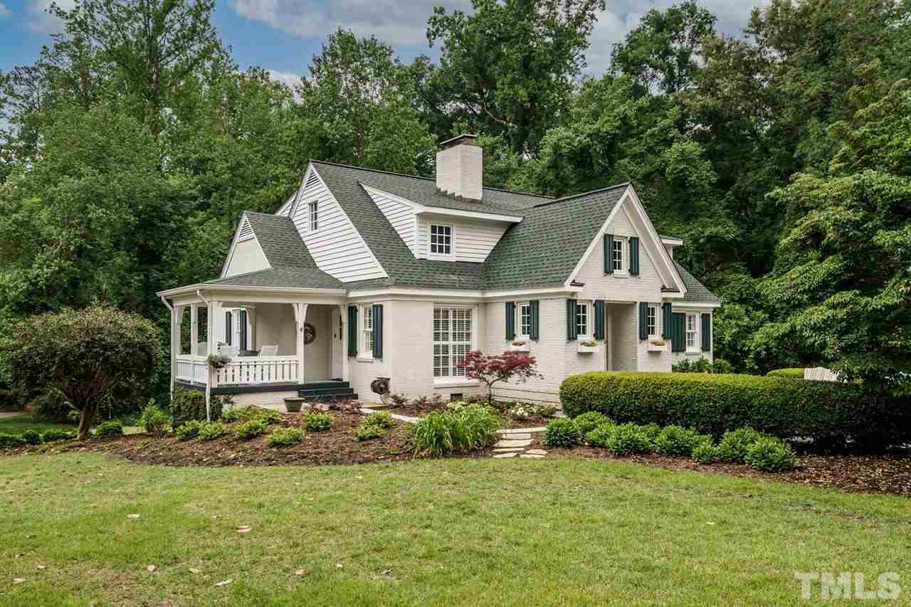 503 Yarmouth Road Raleigh, NC 27608 - Photo 30 of 30 a front view of a house with a garden