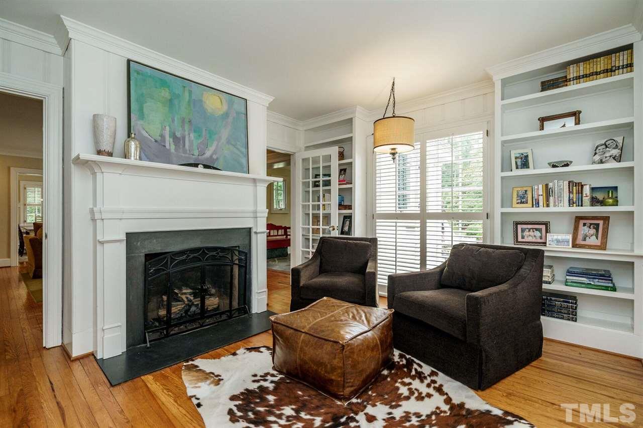 503 Yarmouth Road Raleigh, NC 27608 - Photo 8 of 30 a living room with furniture fireplace and window