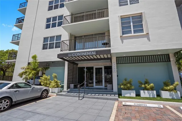 a view of a car park in front of building