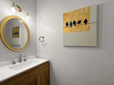 a bathroom with a toilet and a sink