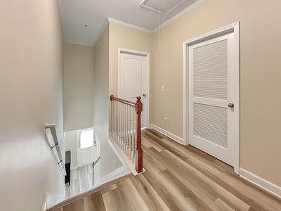 1232 Harris Commons Place, Unit 15 Roswell, GA 30076 - Photo 18 of 36 a view of a room with staircase