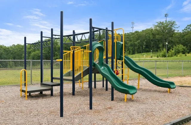 a park with lawn chairs