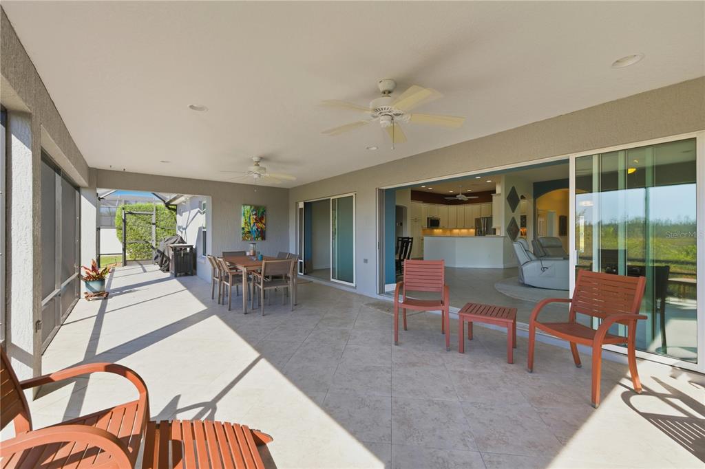 1016 Pickering Path The Villages, FL 32163 - Photo 28 of 38 a living room with furniture and a large window