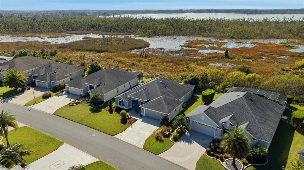 1016 Pickering Path The Villages, FL 32163 - Photo 37 of 38 an aerial view of residential houses with outdoor space
