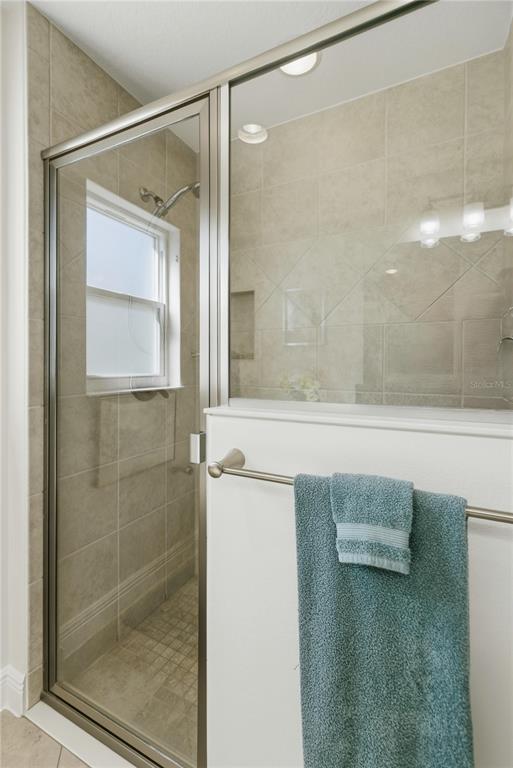 1016 Pickering Path The Villages, FL 32163 - Photo 8 of 38 a bathroom with a shower and a sink