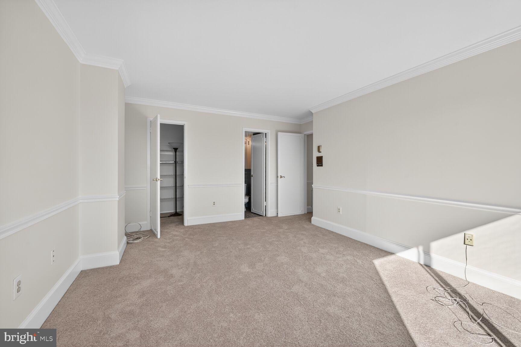 1111 University Boulevard West, Unit 1016 & 1017 Silver Spring, MD 20902 - Photo 14 of 38 a view of an empty room with closet