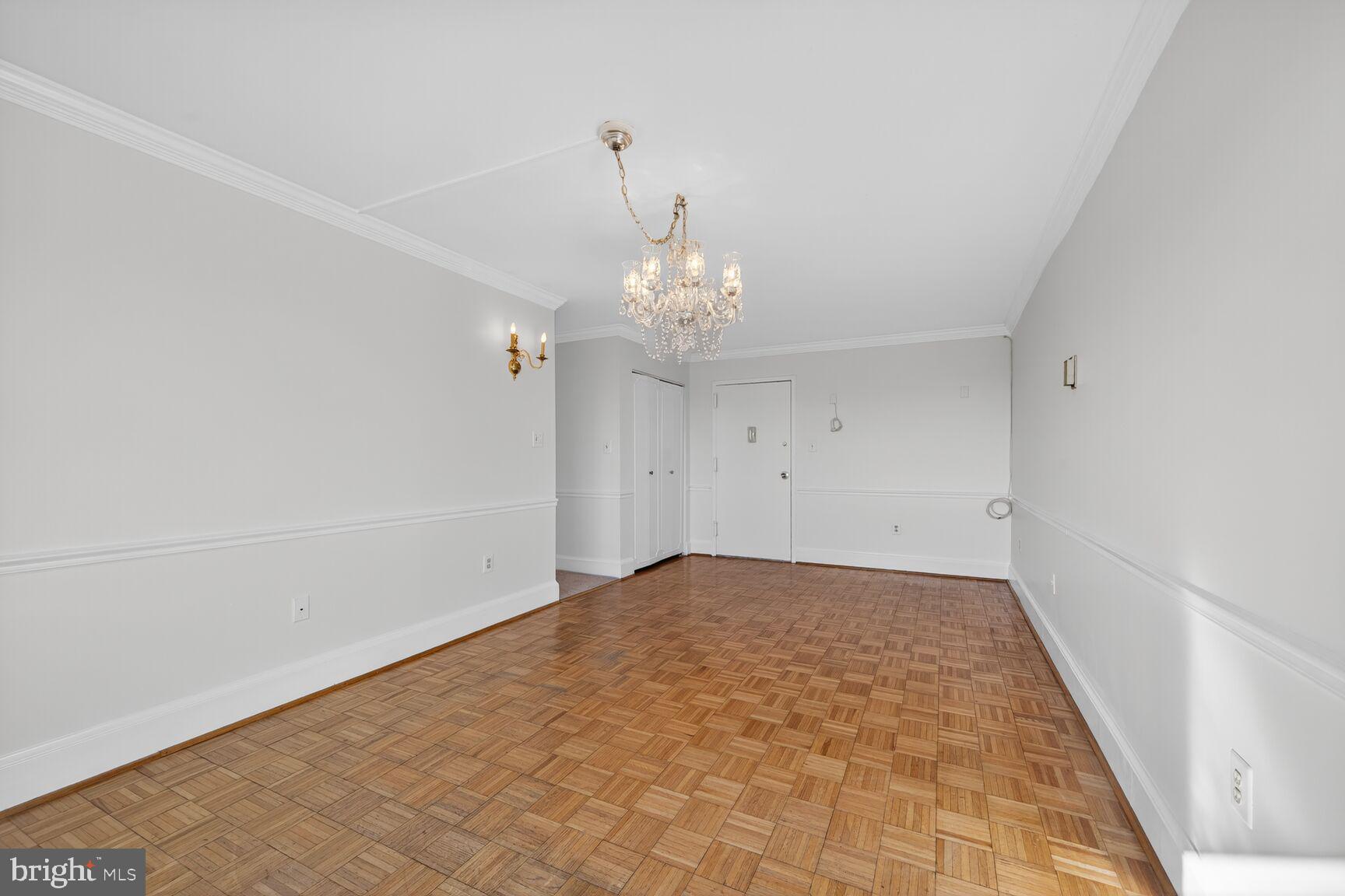 1111 University Boulevard West, Unit 1016 & 1017 Silver Spring, MD 20902 - Photo 7 of 38 wooden floor in an empty room