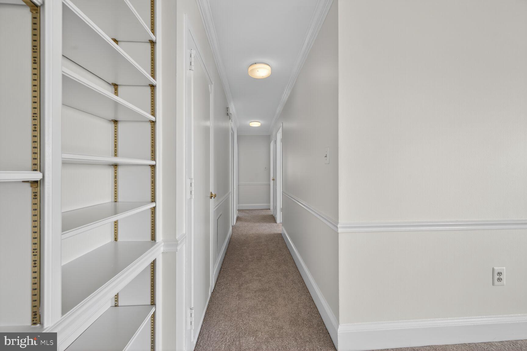 1111 University Boulevard West, Unit 1016 & 1017 Silver Spring, MD 20902 - Photo 8 of 38 a view of a hallway