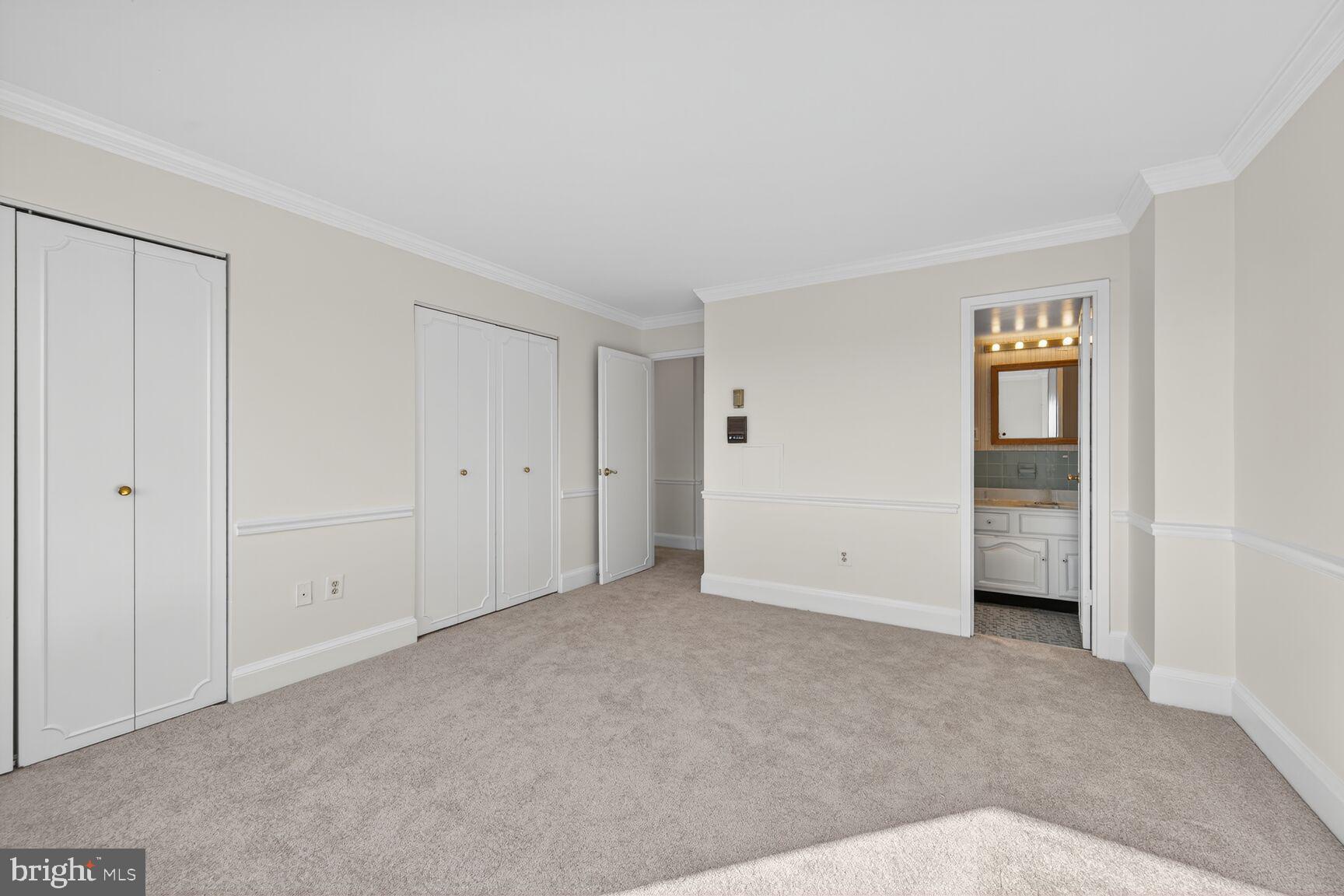 1111 University Boulevard West, Unit 1016 & 1017 Silver Spring, MD 20902 - Photo 10 of 38 a view of an empty room with closet area
