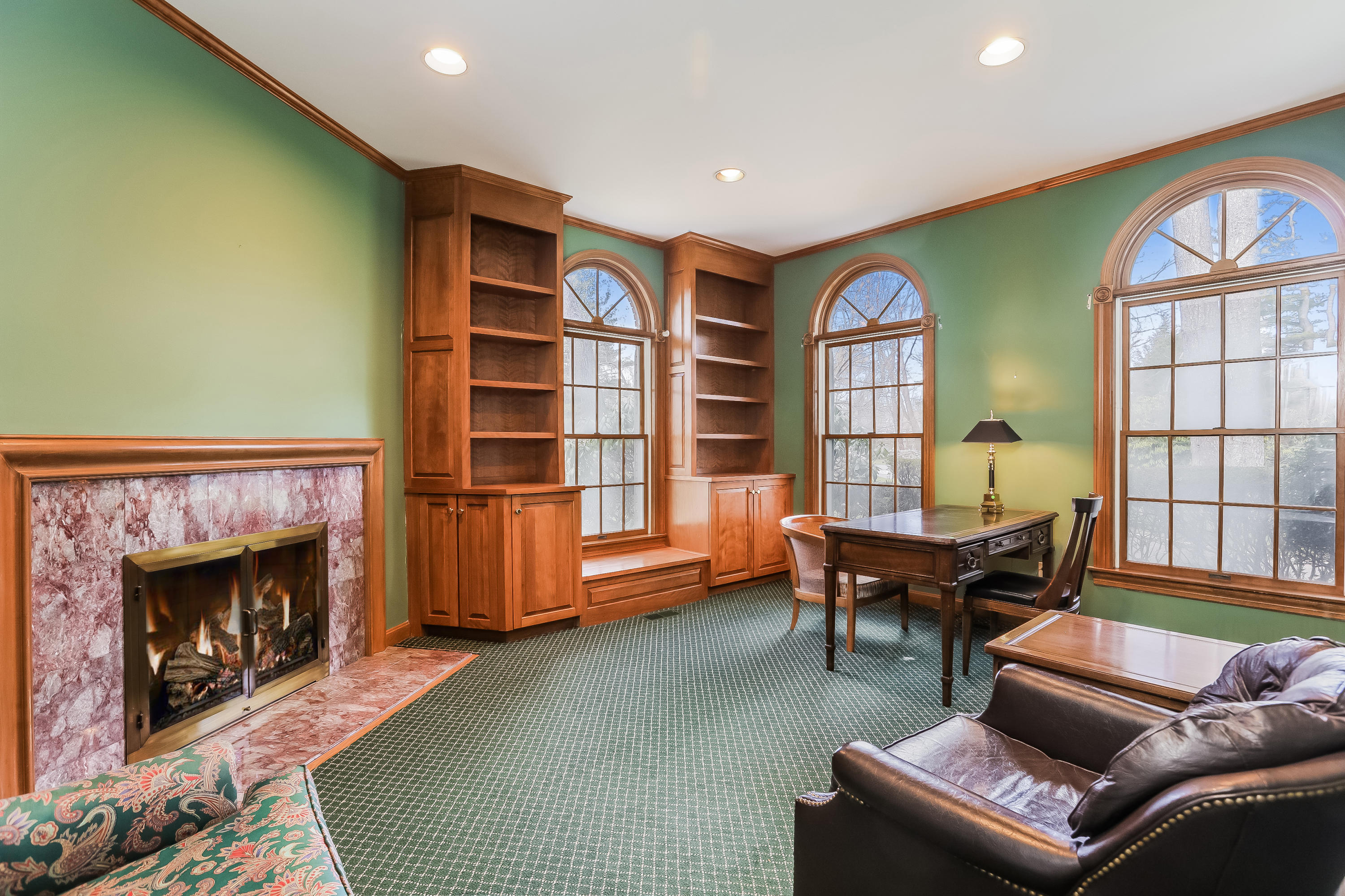 1 Shields Lane Darien, CT 06820 - Photo 16 of 41 a living room with furniture and a fireplace