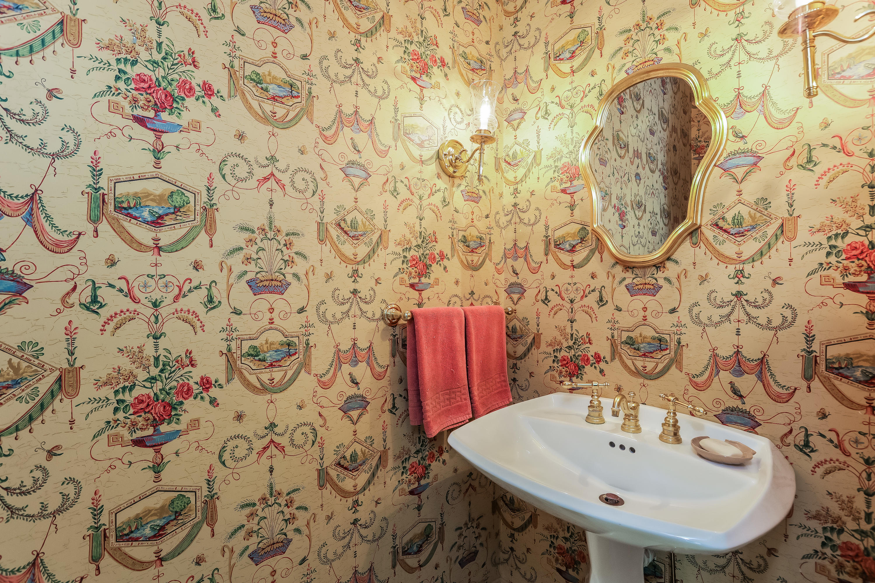 1 Shields Lane Darien, CT 06820 - Photo 17 of 41 a bathroom with a sink and a mirror