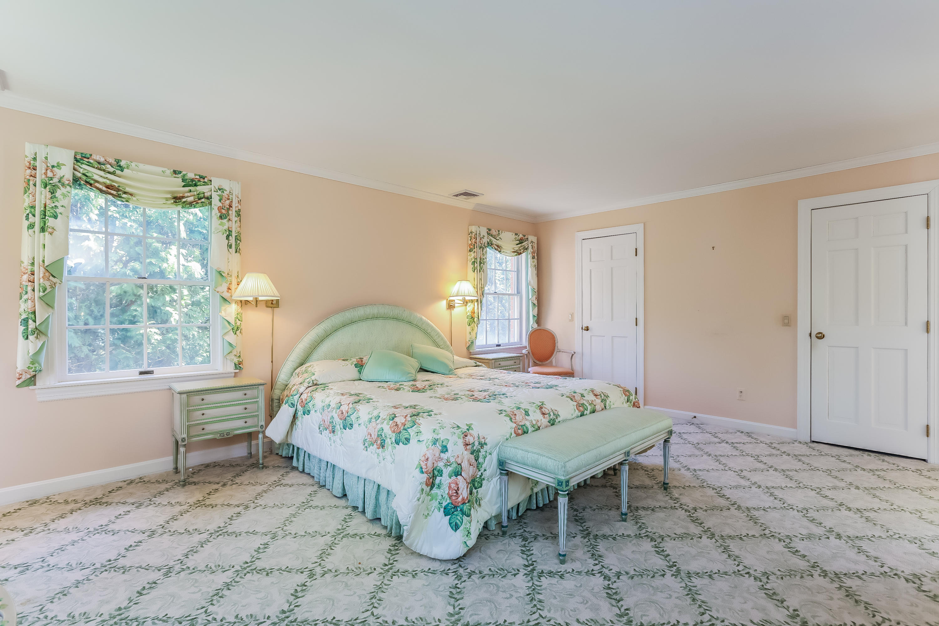 1 Shields Lane Darien, CT 06820 - Photo 20 of 41 a bedroom with a bed table and window