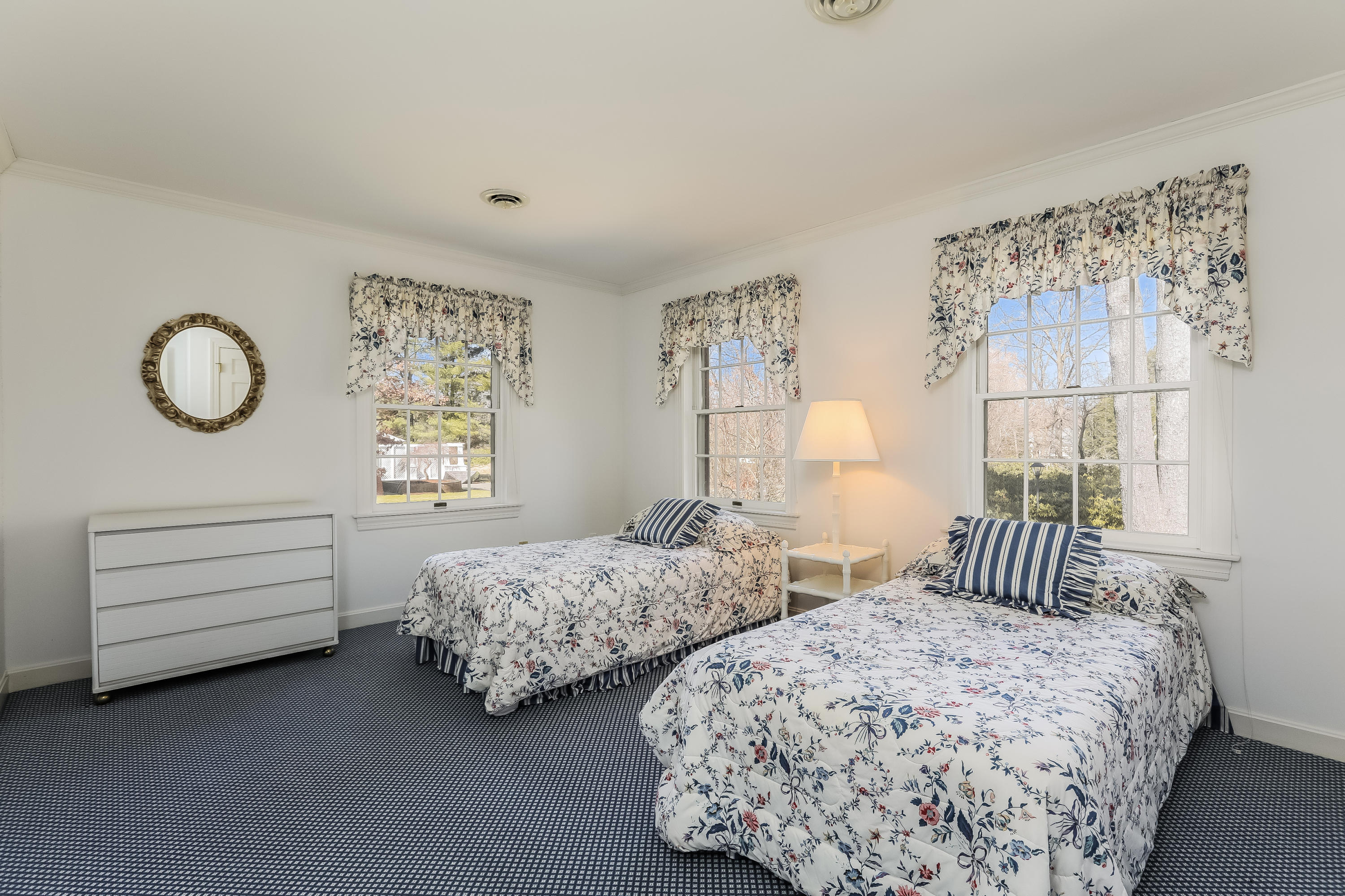 1 Shields Lane Darien, CT 06820 - Photo 26 of 41 a bedroom with two beds and a window