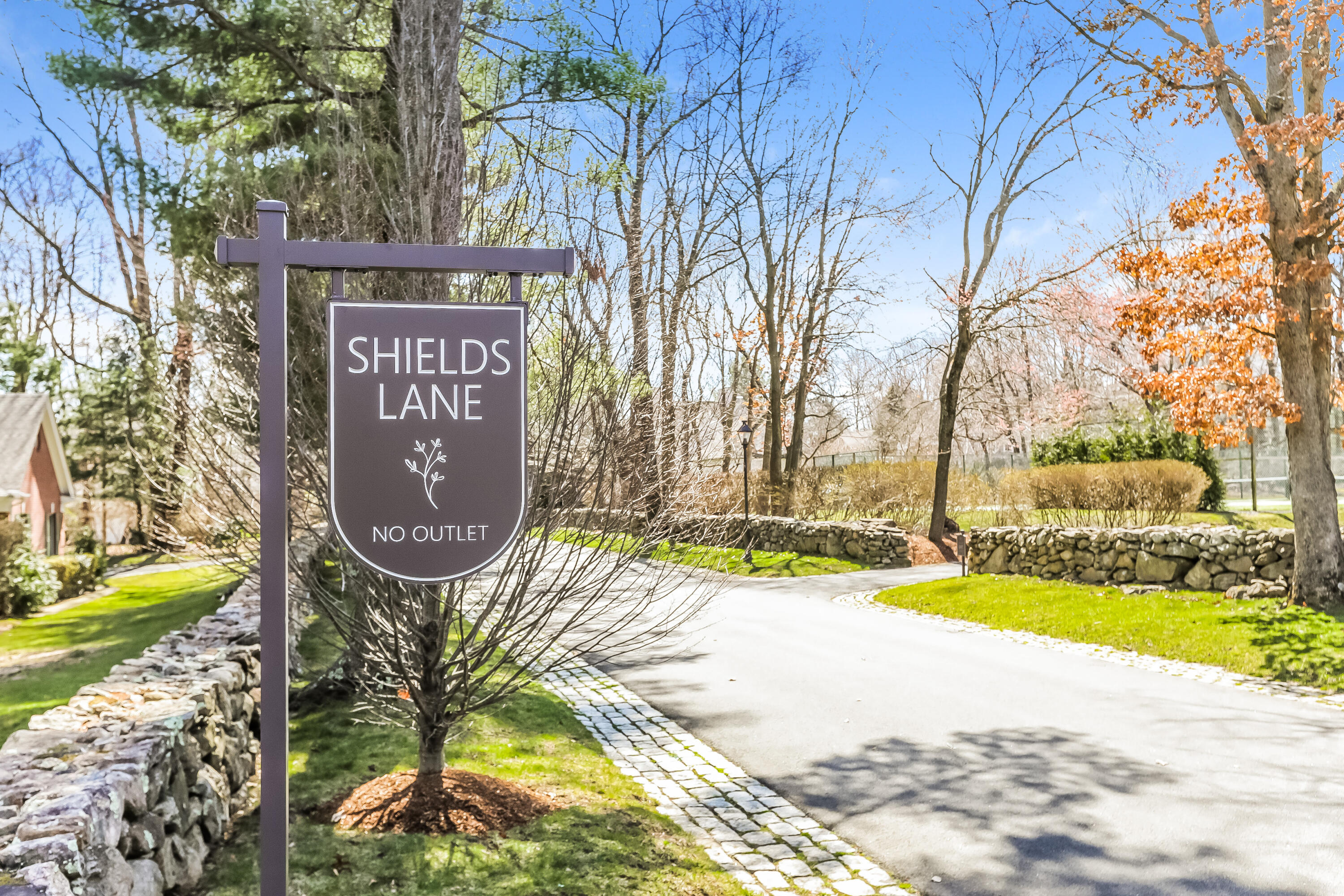 1 Shields Lane Darien, CT 06820 - Photo 35 of 41 a sign that is on the side of a building