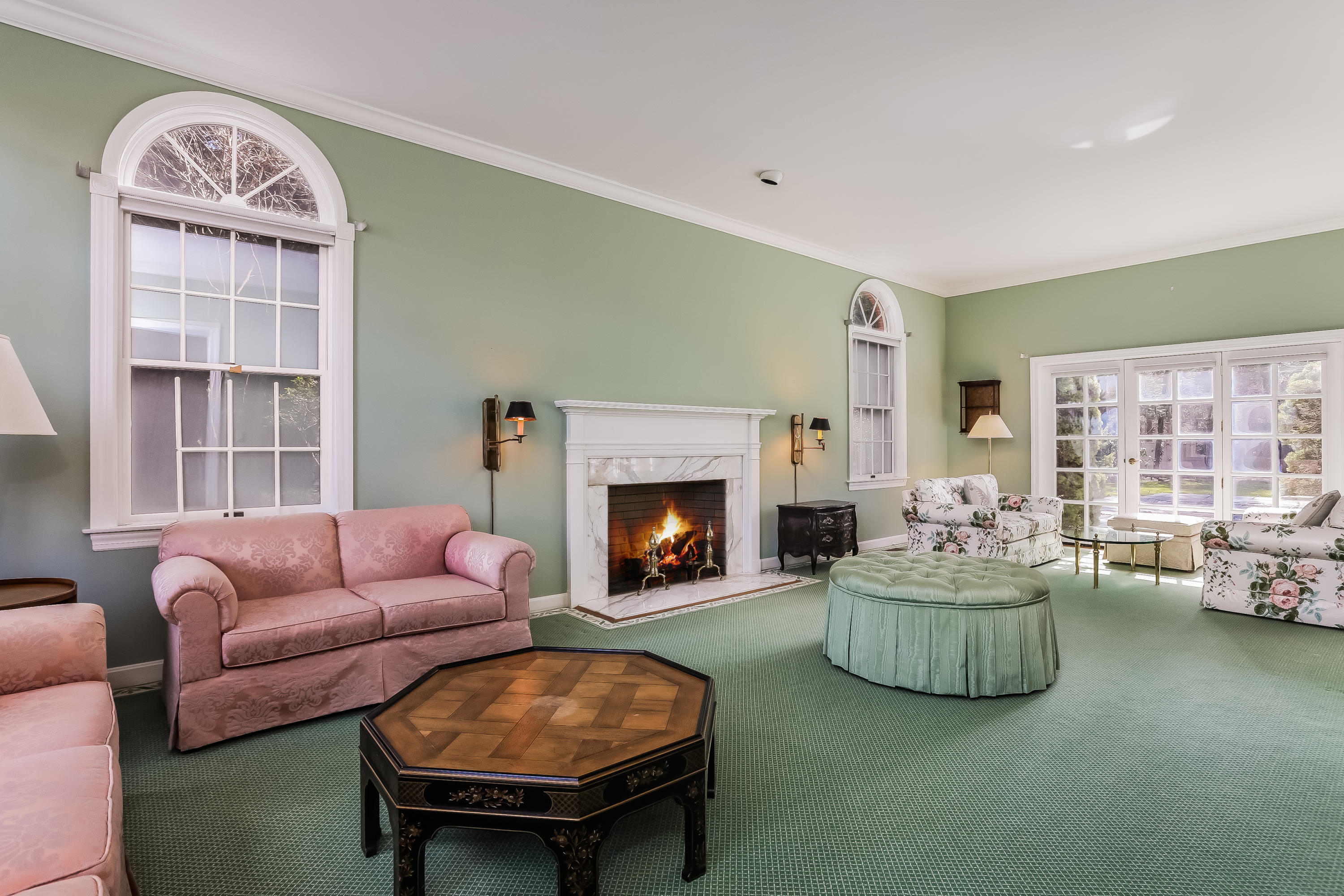 1 Shields Lane Darien, CT 06820 - Photo 6 of 41 a living room with furniture and a fireplace
