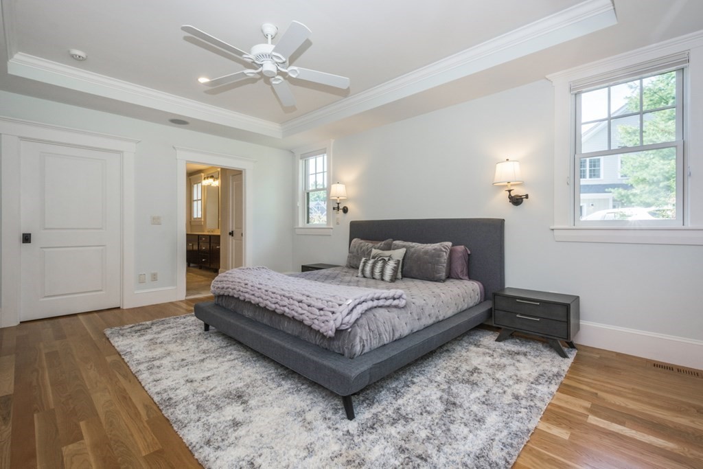 21 Sage Hill Road Wayland, MA 01778 - Photo 23 of 42 a spacious bedroom with a bed and window