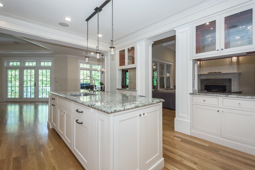 21 Sage Hill Road Wayland, MA 01778 - Photo 3 of 42 a kitchen with a sink and a large window