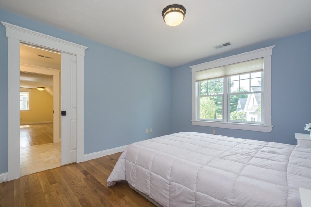 21 Sage Hill Road Wayland, MA 01778 - Photo 35 of 42 a bedroom with a bed and a window