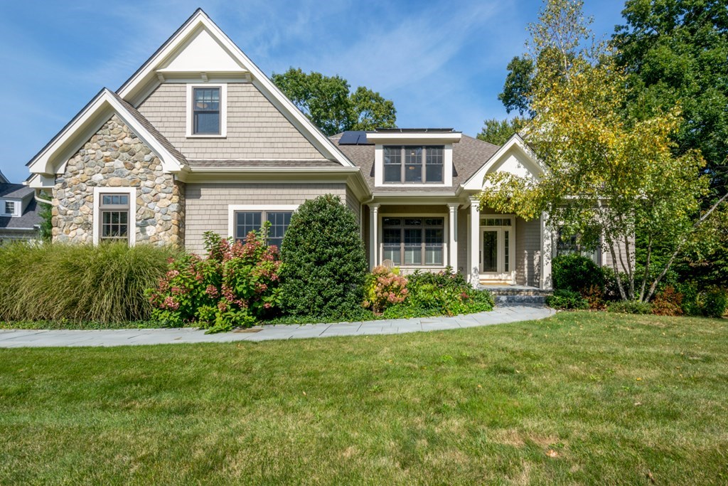 21 Sage Hill Road Wayland, MA 01778 - Photo 40 of 42 a view of a house with a yard and plants