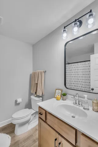 a view of house with backyard