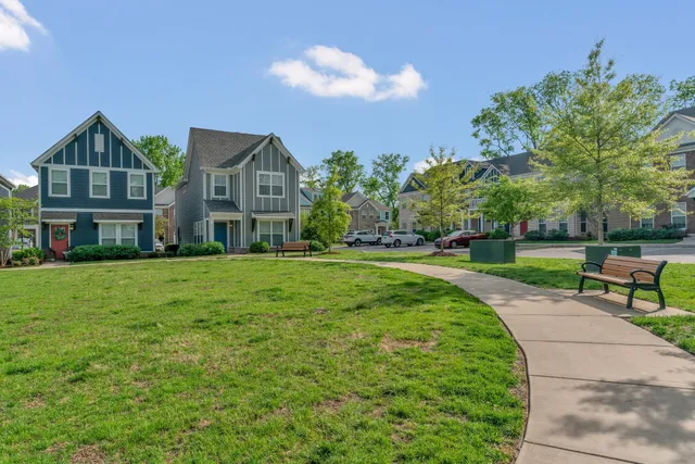 a view of a park with swings