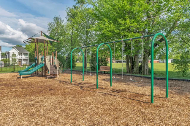 a view of a park with swings