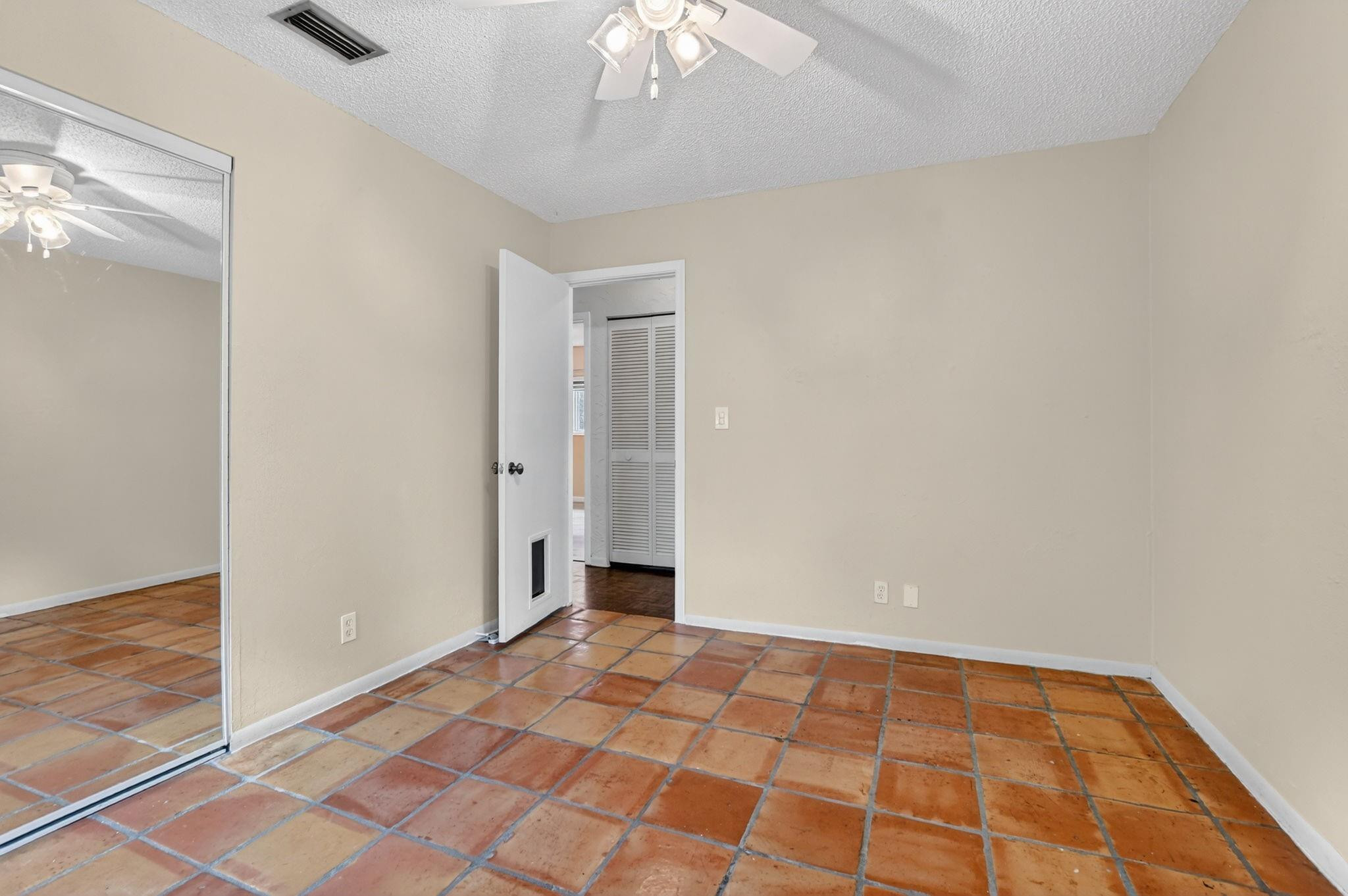 501 Northwest 54th Street Boca Raton, FL 33487 - Photo 27 of 44 a view of an empty room
