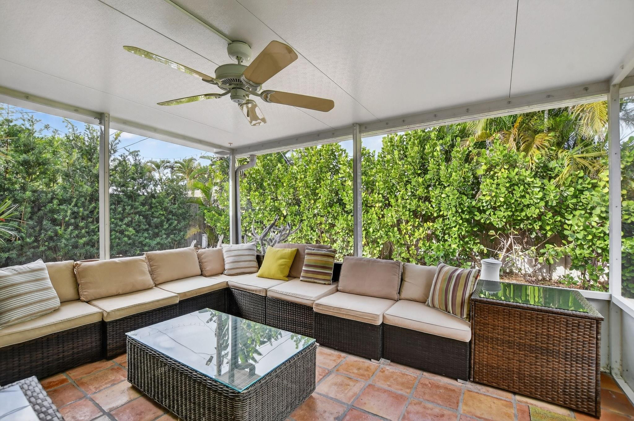 501 Northwest 54th Street Boca Raton, FL 33487 - Photo 32 of 44 a outdoor living space with furniture and garden view