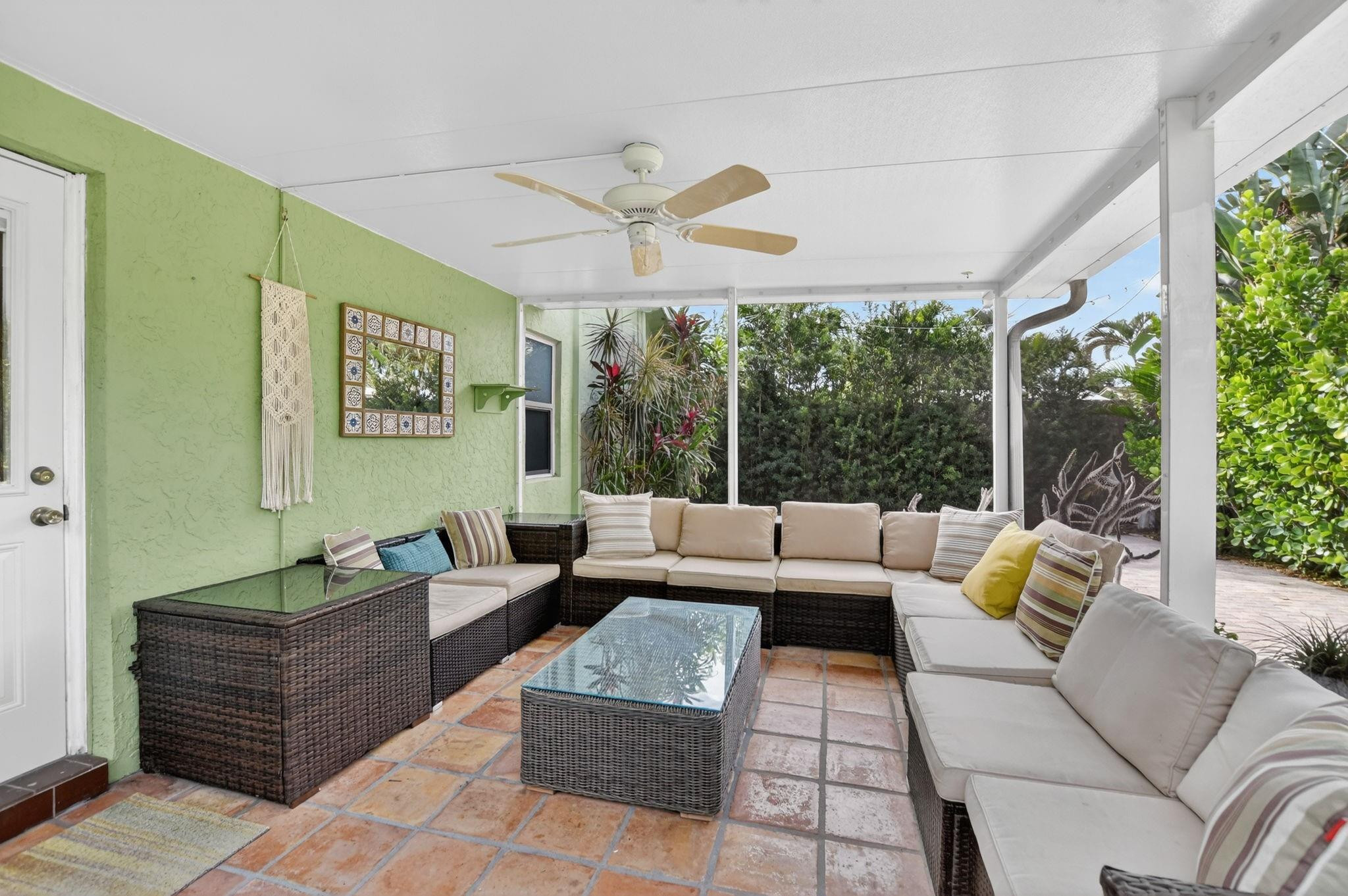 501 Northwest 54th Street Boca Raton, FL 33487 - Photo 33 of 44 a living room with furniture and large windows