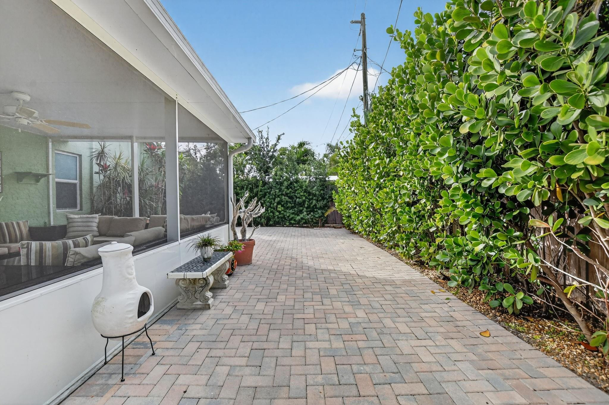 501 Northwest 54th Street Boca Raton, FL 33487 - Photo 37 of 44 a view of an outdoor space with seating area