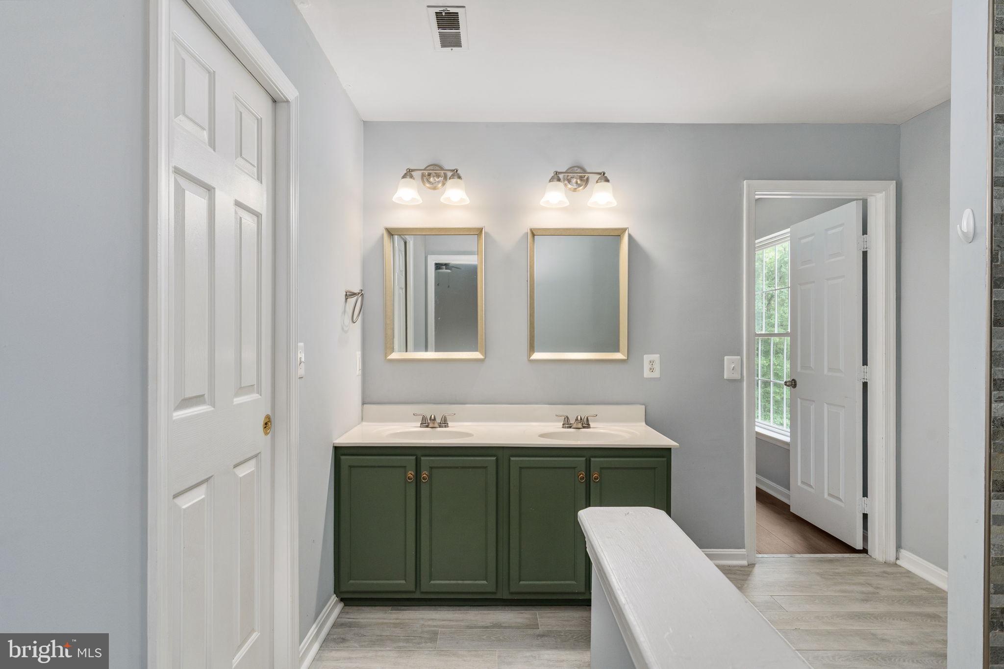 60 River Falls Road Fredericksburg, VA 22406 - Photo 39 of 73 Jack and jill bathroom has double sink vanity