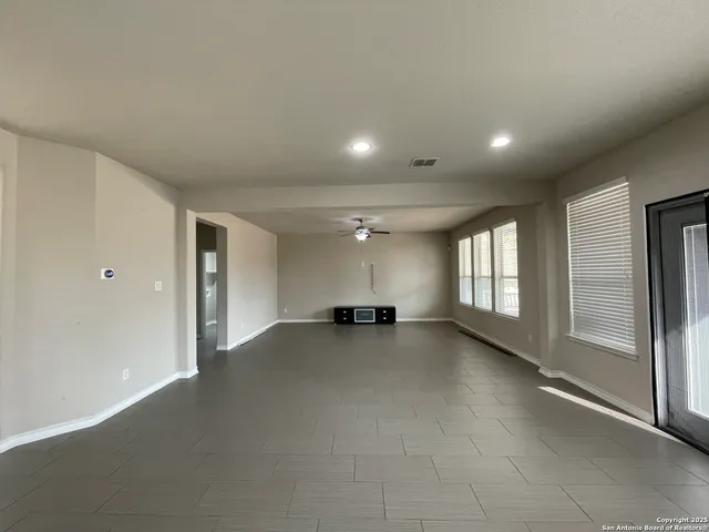 a view of a livingroom with a staircase