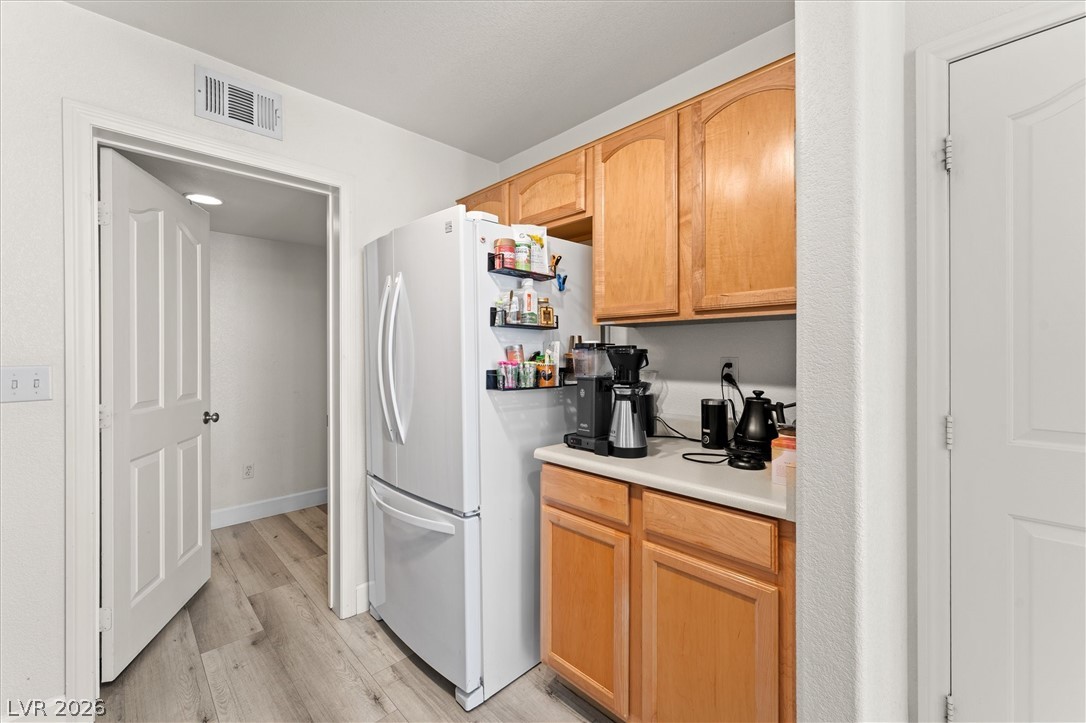 503 Rafkin Place Henderson, NV 89052 - Photo 11 of 18 Functional kitchen with ample cabinet space, offering practical living and culinary convenience.