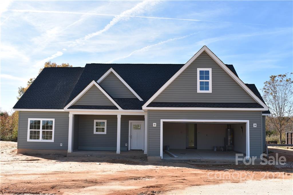 2127 State Rd S-46-1474, Unit 4 Clover, SC 29710 - Photo 1 of 23 a front view of a house with a yard