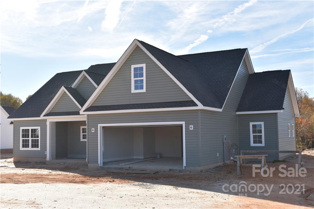 2127 State Rd S-46-1474, Unit 4 Clover, SC 29710 - Photo 22 of 23 a front view of a house with a yard