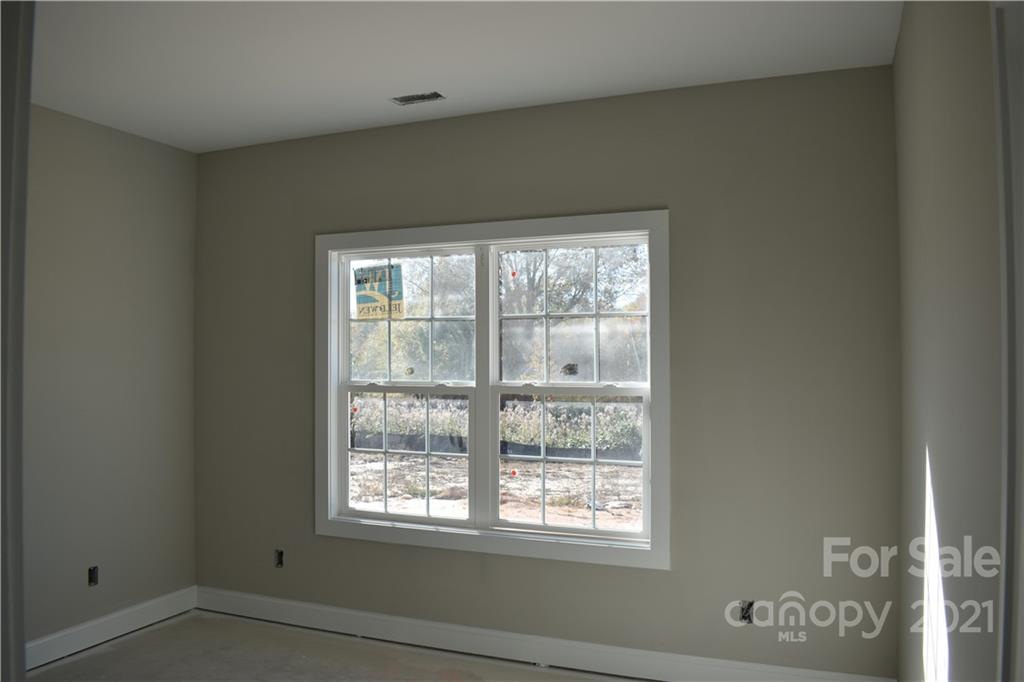 2127 State Rd S-46-1474, Unit 4 Clover, SC 29710 - Photo 8 of 23 a view of an empty room with a window