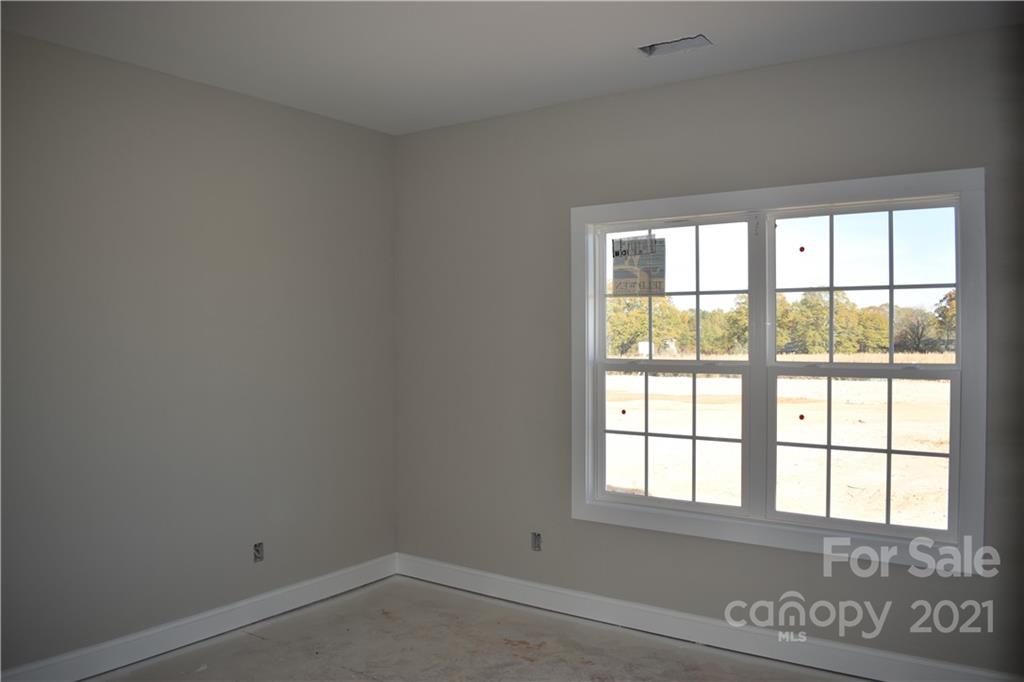 2127 State Rd S-46-1474, Unit 4 Clover, SC 29710 - Photo 9 of 23 an empty room with a window